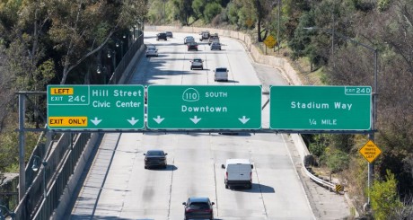 Cars passing through a highway | What Happens to My Car Insurance If I Move States?